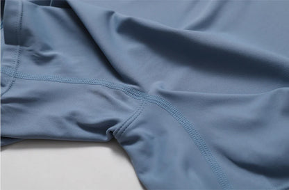 European and American nude one-piece yoga suit with stand up collar, half zipper, short sleeved fitness jumpsuit, tight fitting